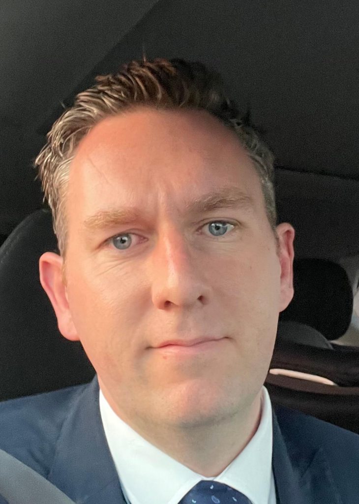 An image of UW partner Greig Muir