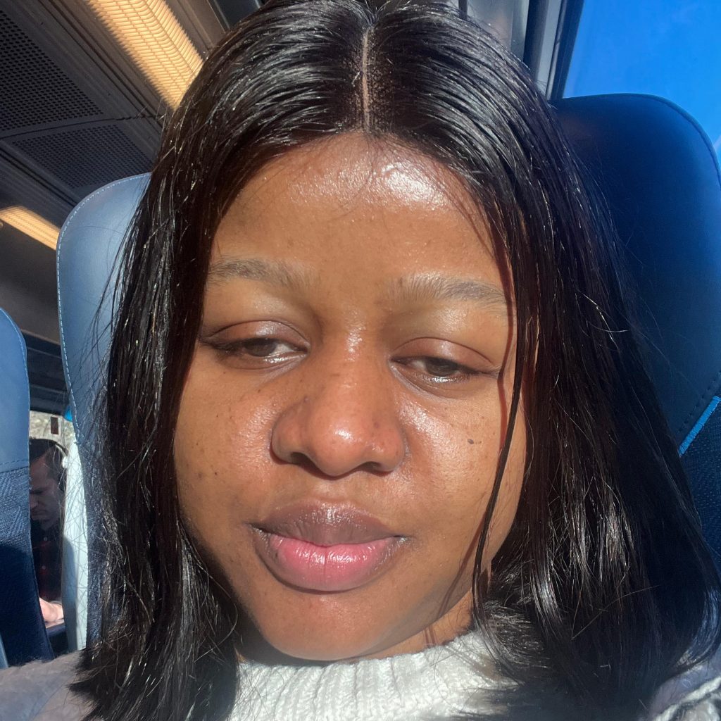 An image of UW partner Happiness Adebanjo