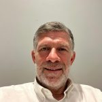 An image of UW partner Paul Thomas