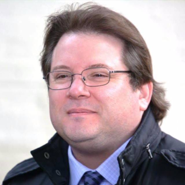 An image of UW partner Alan Owens