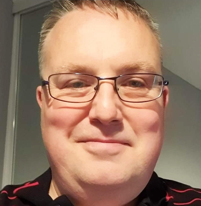 An image of UW partner Darren Barrett