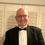 An image of UW partner Gregory de Mello