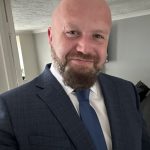 An image of UW partner Edward Neal